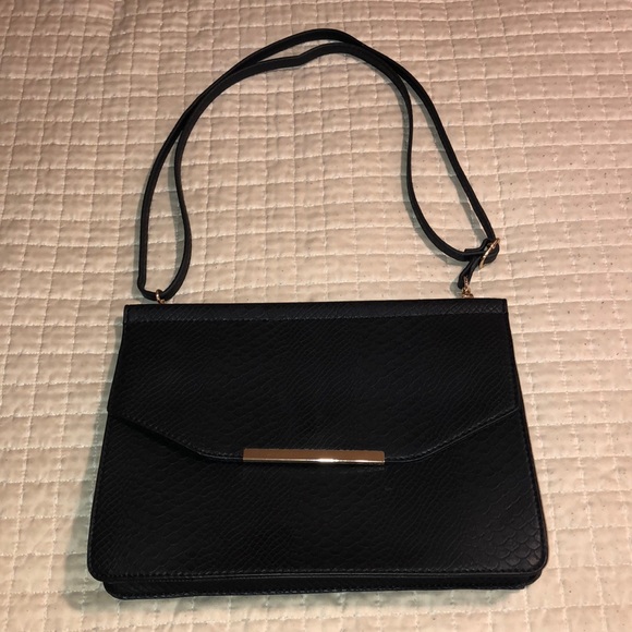 Black clutch. 👜 - Picture 1 of 2